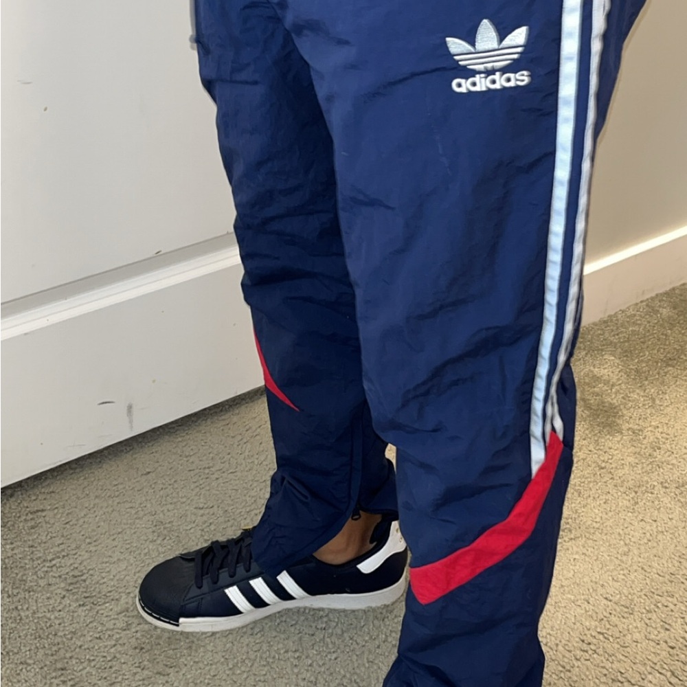 Adidas Men's Blue Track Pants with Red and White Accents